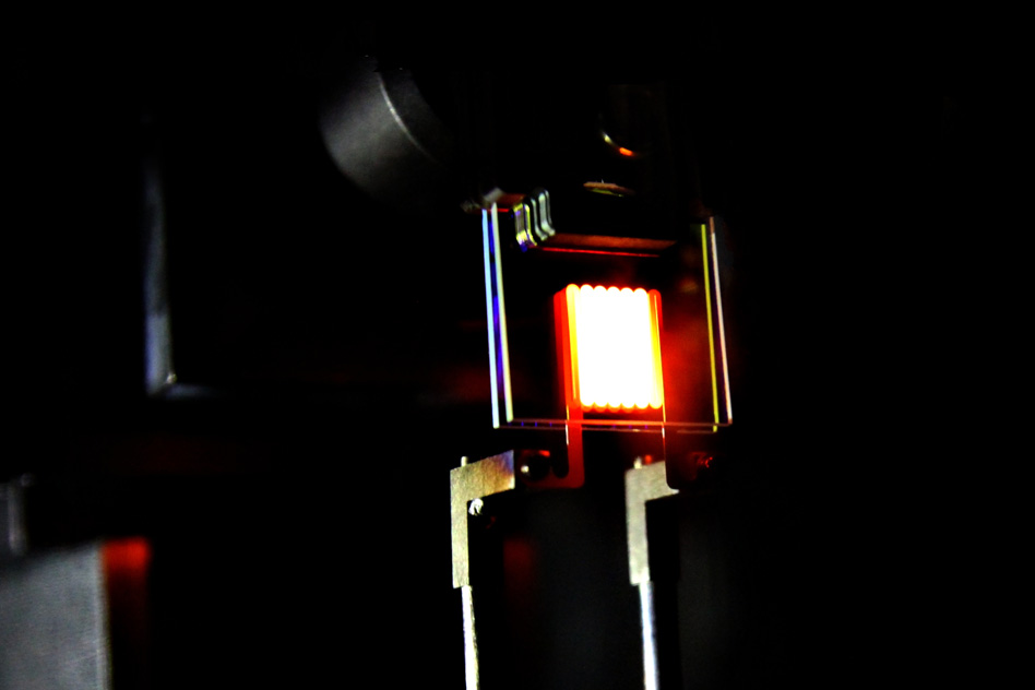 A proof-of-concept device built by MIT researchers demonstrates the process the researchers call "light recycling" to make the incandescent bulbs more efficient.